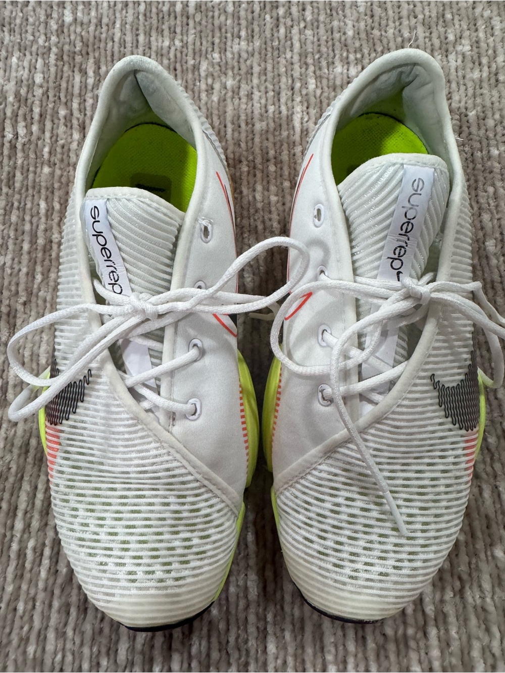 Nike White Training Sneakers with Neon Yellow and Coral Accents